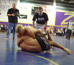 Mike applying a full blown Brabo choke.